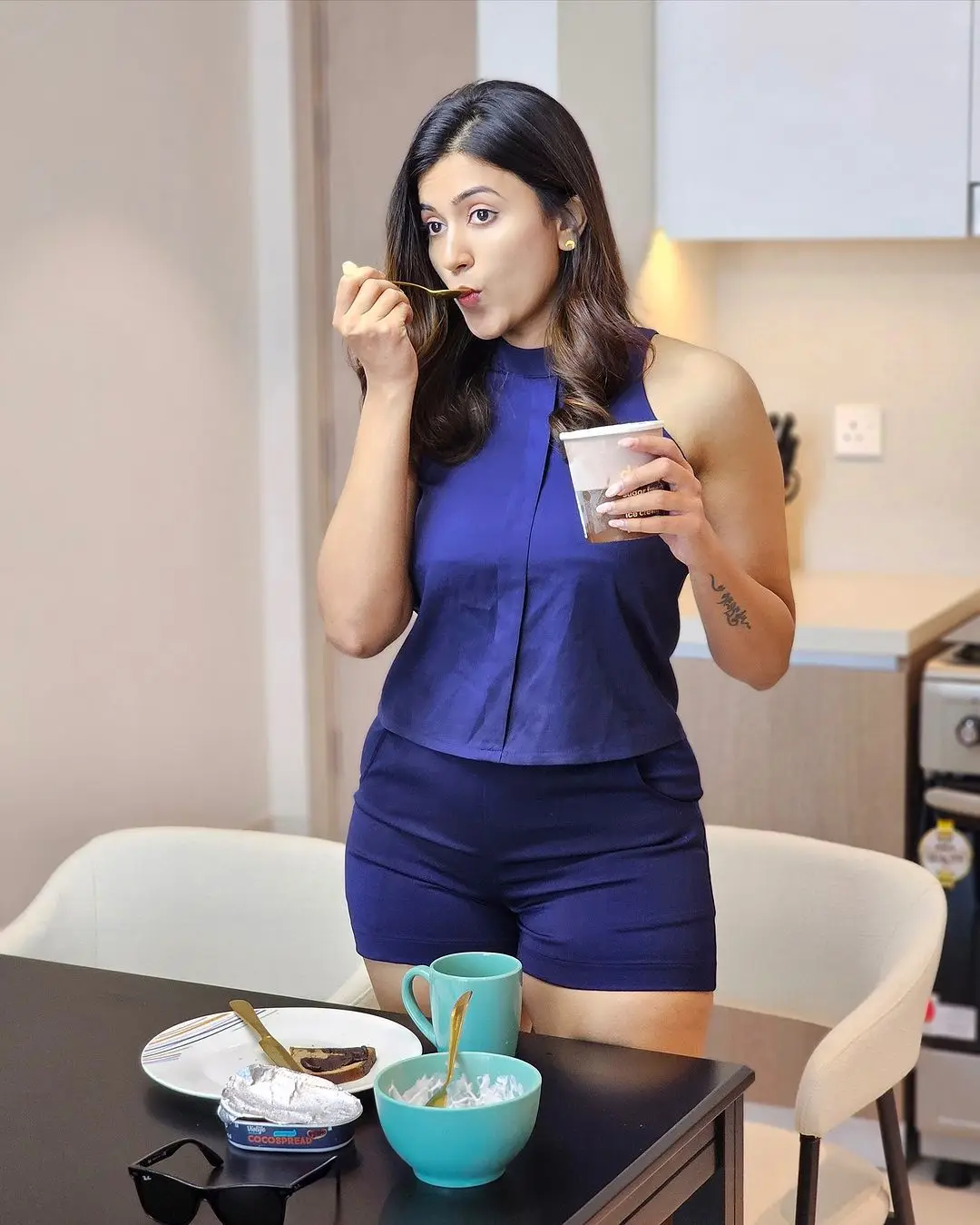 ANJU KURIAN LONG LEGS SHOW IN BLUE SHORT TOP 4